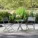 Metal 3 Pieces Garden Bistro Set With Round Glass Table and 2 Folding Chairs - Velmora