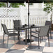 Steel 5 Pieces Garden Dining Set With Glass Top Table And Parasol Hole - Velmora